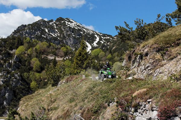 Multiple ATVs on a shared trail